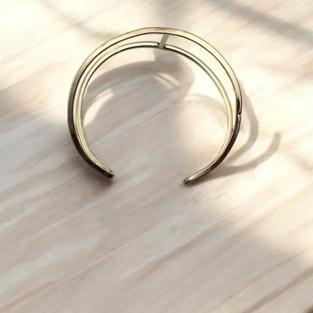 Source Unknown minimalist gold